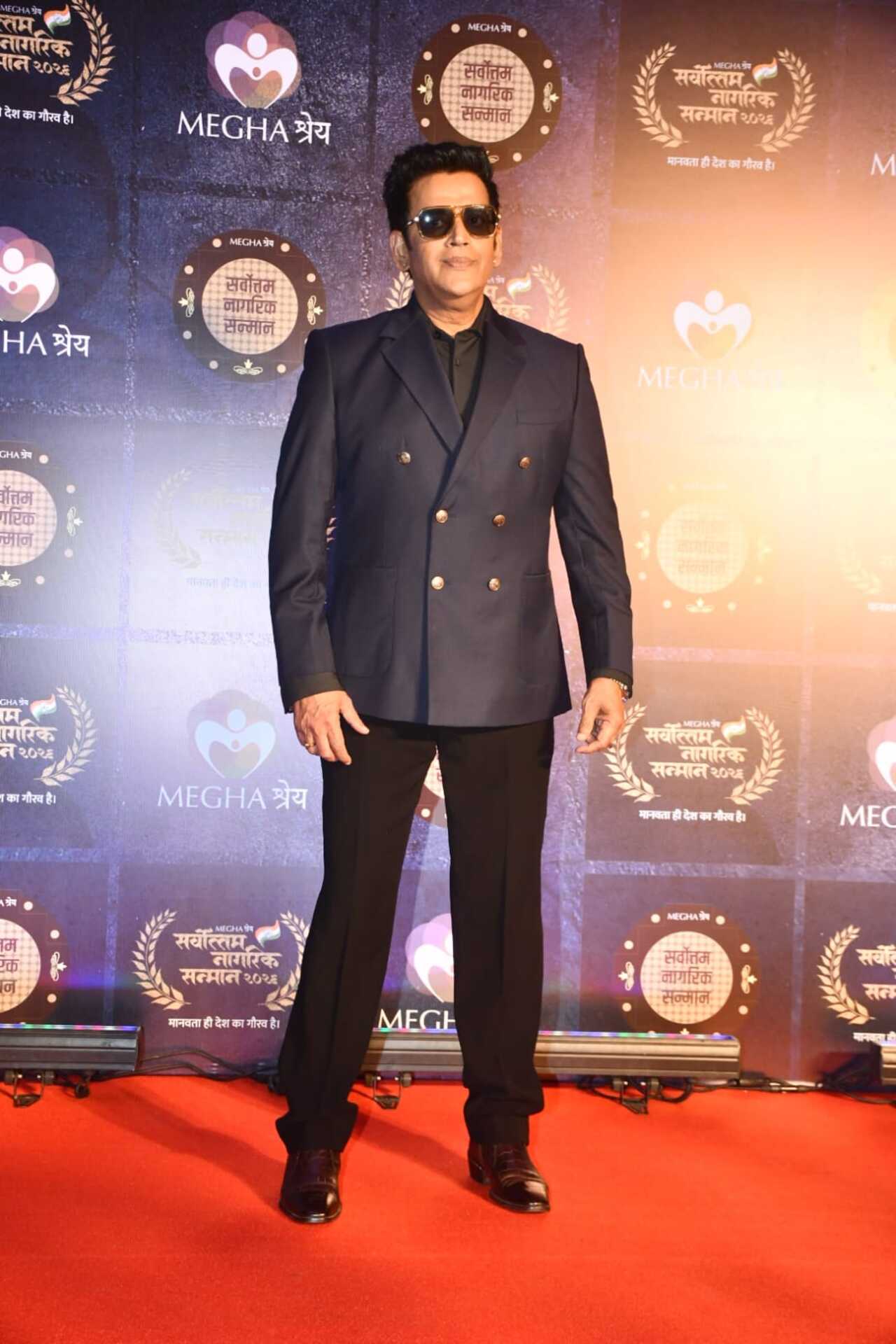 Ravi Kishan was spotted at the Sarvottam Nagrik Samman 2026 red carpet venue in Mumbai rocking a sharp navy blue double-breasted suit jacket with dark sunglasses